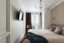 Long bedroom with balcony design