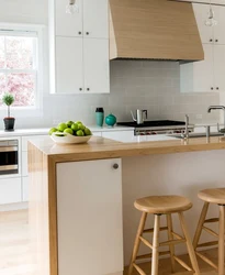 Photo Of A Kitchen With A Wood-Colored Countertop