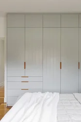 Bedroom wardrobes with hinged photos inside