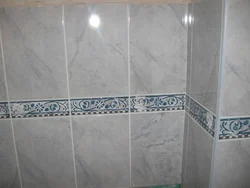 Tiles with border in the bathroom photo