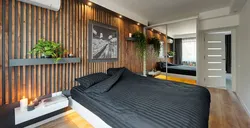 Wooden slats on the wall in the bedroom interior