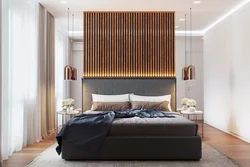Wooden slats on the wall in the bedroom interior