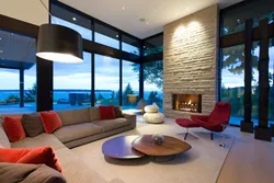 Living room design in a modern style house with large windows