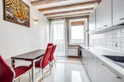 Interior design of a modern kitchen with a balcony