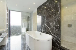 Black marble tiles in the bathroom photo design