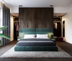 Bedroom design with dressing room behind the bed