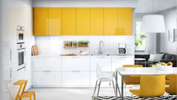 Yellow and white kitchen design photo