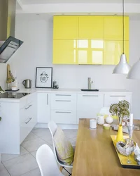 Yellow and white kitchen design photo