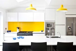 Yellow and white kitchen design photo