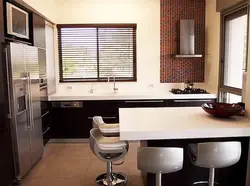 Kitchen with bar table by the window photo