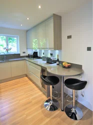 Kitchen with bar table by the window photo