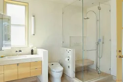 Design Of A Bathroom And Toilet With A Shower In A House With A Window