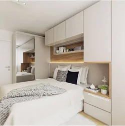Bedroom design with a window 14 sq m
