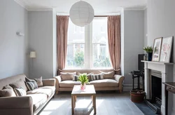 Photo of a living room in an apartment with two sofas
