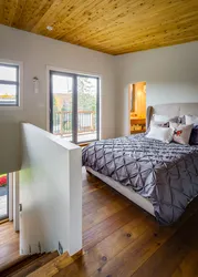 Bedroom with wooden ceiling photo