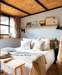 Bedroom with wooden ceiling photo