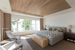 Bedroom with wooden ceiling photo