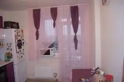 Photo of a curtain for the kitchen with a balcony door