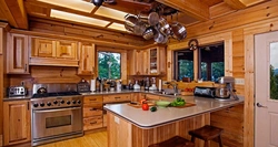 Kitchen design in a wooden house photo