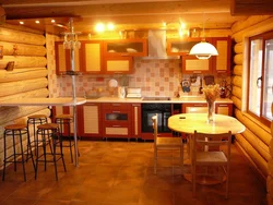 Kitchen design in a wooden house photo