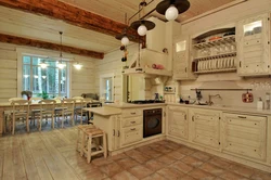 Kitchen design in a wooden house photo