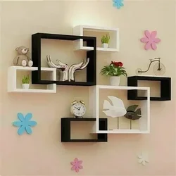 Modern shelves on the wall in the bedroom photo