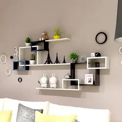 Modern shelves on the wall in the bedroom photo
