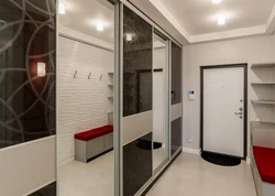 Hallway design with built-in wardrobe in a modern style apartment
