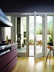 Interior Of A Kitchen With A Balcony Door