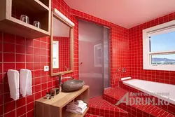 Bathroom design in red colors photo