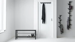 Photo of hangers in the hallway in a modern style