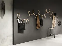 Photo of hangers in the hallway in a modern style