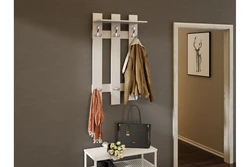 Photo of hangers in the hallway in a modern style