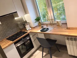 Countertop Together With A Window Sill In The Kitchen Photo