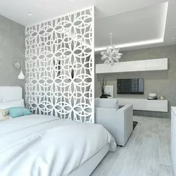 Living room interior with bed in apartment