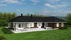 One-story house with three bedrooms and a terrace photo