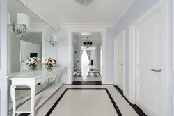 Photo of hallway design with white doors