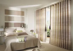 Stylish curtains in the bedroom interior