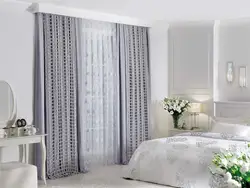 Stylish curtains in the bedroom interior