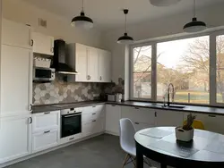 Kitchen with high window photo