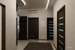 Hallway design with dark doors photo