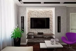 Apartment interior with TV on the wall