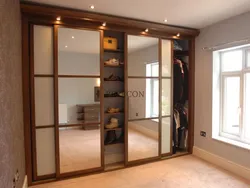 Wardrobe in the hallway hallway with a mirror photo