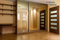 Wardrobe in the hallway hallway with a mirror photo