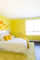 Bedroom interior in yellow tones photo