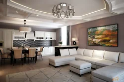 Interior of a living room combined with a kitchen in a modern style photo