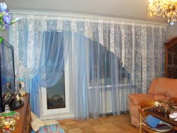 Curtain design for a living room in a modern style with a balcony