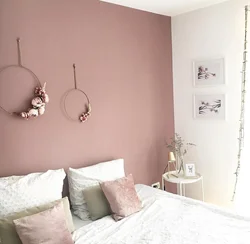 Dusty rose color photo in the bedroom interior