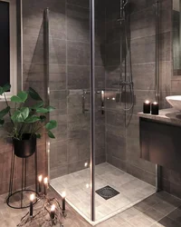 Shower In A Bathroom Without A Cubicle Made Of Tiles Photo