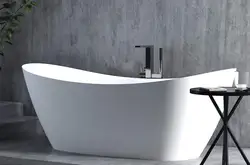 Bathtub with artificial stone photo